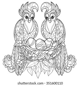 Zentangle stylized parrot on nest. Hand Drawn vector illustration. Sketch for tattoo,coloring or makhenda. Bird collection.