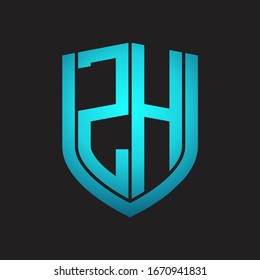 Monograma del logotipo ZH con diseño de escudo de emblemas aislado con colores azules sobre fondo negro