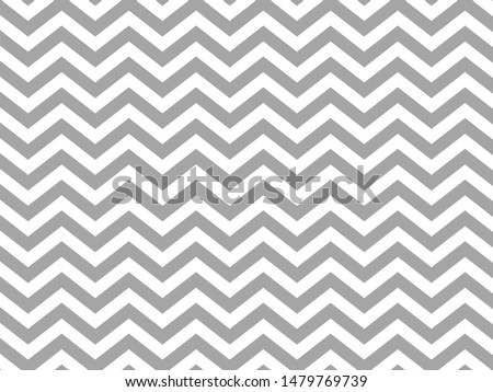 Zig zag chevron gray and white tile pattern
