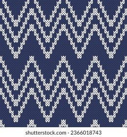 Zig zag knitted seamless pattern for sweater or socks design. White on navy background. Vector illustration