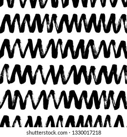 Zig zag scribbles hand drawn seamless pattern. Vector waves, lines grunge paintbrush drawing. Black paint dry brushstroke abstract background. Ink brush texture. Wrapping paper, wallpaper design.