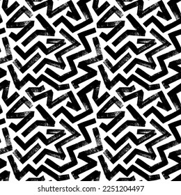 Zig zag vector seamless pattern. Brush drawn thick brush strokes. Intricate black and white ornament. Seamless pattern with chaotic geometric lines. Zig zag bold stripes with dry grunge texture.