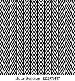 Zigzag black and white vector seamless pattern. Ornamental tribal chevron background. Repeat monochrome geometric backdrop. Abstract modern decorative striped ornament with zig zag lines, stripes