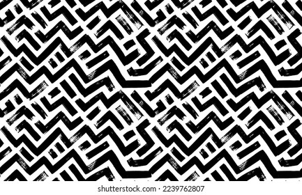 Zigzag chevron grunge seamless pattern. Brush drawn vector geometric wallpaper. Abstract zig zag seamless background with bold brush strokes. Modern stylish texture. Broken lines with rough edges. 