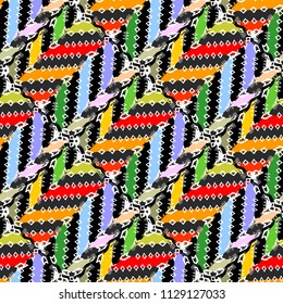 Zigzag ethnic style tribal vector seamless pattern. Striped colorful geometric background. Abstract bright doodle ornaments with multicolor stripes, zigzag, geometry shapes, rhombus. Creative design