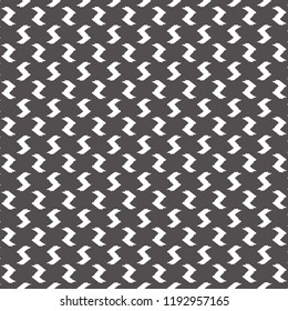 Zigzag fragments on dark brown background. Seamless textile pattern. Vector illustration.