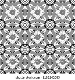Zigzag and stripe line, rhombus and tiles. Vector tribal design in white, gray and black colors. For textile, wallpaper, wrapping paper. Ethnic theme. Hand drawn seamless pattern.