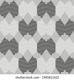 Zigzag of stripes. A mosaic of striped geometric figures. Seamless pattern. Design with manual hatching. Textile. Ethnic boho ornament. Vector illustration for web design or print.