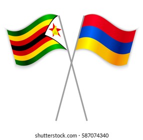 Zimbabwean and Armenian crossed flags. Zimbabwe combined with Armenia isolated on white. Language learning, international business or travel concept.