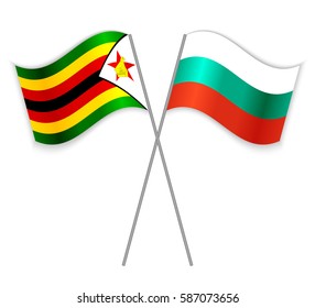 Zimbabwean and Bulgarian crossed flags. Zimbabwe combined with Bulgaria isolated on white. Language learning, international business or travel concept.