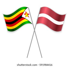 Zimbabwean and Latvian crossed flags. Zimbabwe combined with Latvia isolated on white. Language learning, international business or travel concept.