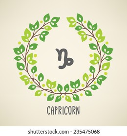 Zodiac sign Capricorn (The Sea-Goat) in Earth element wreath. Part of horoscope zodiac signs collection. Vector illustration. Perfect for calendars, greeting cards, horoscopes