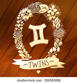 Zodiac sign Gemini (Twins), in a sweet gold floral wreath on vector wood planks. Horoscope sign, flowers, leaves and ribbon. 