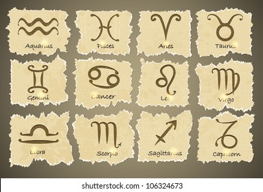 Zodiac sign set on old torn paper