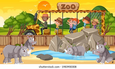 Zoológico al atardecer con muchos niños viendo la ilustración del grupo rinoceronte