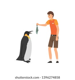 Zoo Worker Feeding Penguin Fish, Professional Zookeeper Character Caring of Animals Vector Illustration