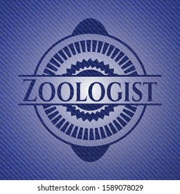 Zoologist badge with jean texture. Vector Illustration. Detailed.