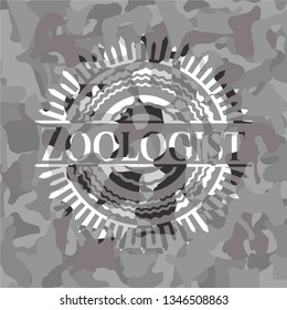 Zoologist on grey camouflage texture