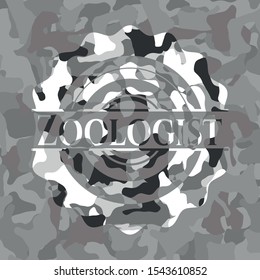 Zoologist on grey camouflage texture