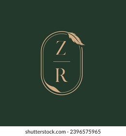Concepto de plumas de ZR diseño del logo de monograma de boda como inspiración