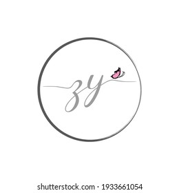 ZY initial letter handwriting logo design with butterfly