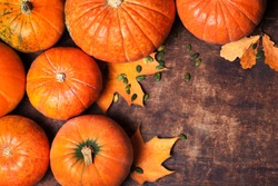  Autumn Pumpkin Thanksgiving Background - orange pumpkins over wooden table 