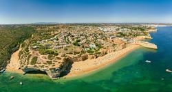 Aerial drone panoramic views of Praia Nova and Praia de Nossa beach, Algarve, Portugal