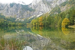 Fall landscape with reflections in the Austrian alps
