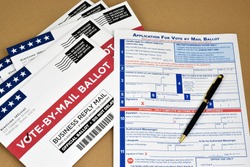 Mockup of Vote by Mail Ballot envelopes and application letter to vote by mail for election.