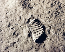 Astronaut's boot print on lunar (moon) landing mission. Elements of this image furnished by NASA.