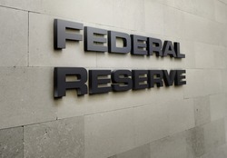 A building signage that says 'Federal Reserve'.