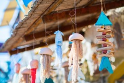Wooden souvenirs for sale in Klima fishing village on Milos island in Greece