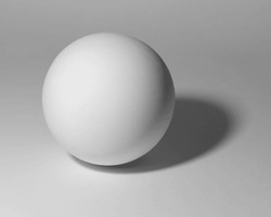 White sphere on white background. Plaster ball with shadow for academic drawing.