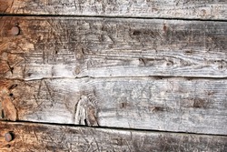 Rustic wood background / old textured wood planks with bolts on one edge