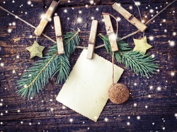 christmas card with stars,fir and fir-cone on wooden background/ Christmas card with christmas natural decorations