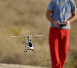 Piloting Radio controlled helicopter with remote control