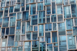 Blue geometric windows of modern building