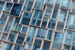 Blue geometric windows of modern building