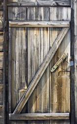 Door made of discoloured pine timber