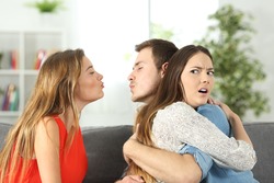 Girlfriend discovering that her boyfriend is cheating with her best friend at home