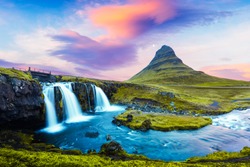 Picturesque landscape with famous Kirkjufell mountain and Kirkjufellsfoss waterfall in eastern Iceland