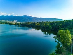 Breeding of freshwater fish in lake with round nets. Rhodope mountains, Europe