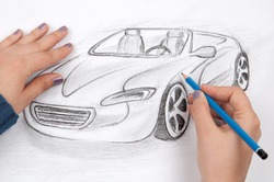 Car designer sketches concept car