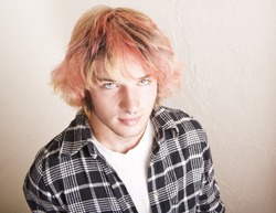 Close-Up of a Punk Boy with Brightly Colored Hair