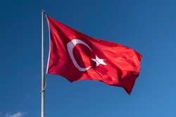 Flag of Turkey. National flag consisting of a red field (background) with a central white star and crescent. 