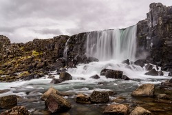Oxararfoss waterfall in Thingvellir National park in Iceland. This is one of the attractions of the Golden Circle tour near Reykjavik.