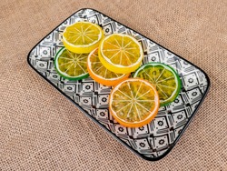 Lemon, orange and lime slices on the table