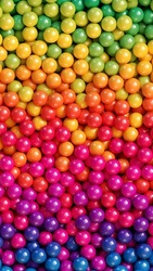 Colorful glossy candy balls background. Abstract background with colorful glossy gradient balls. Vector background