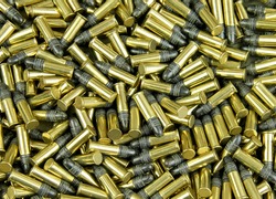 Several Brass cased bullets make a bullet background