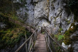 Devil's Path - picturesque eco-path and hiking trail in the Rhodopes mountains, Bulgaria. Wooden  bridge at autumn